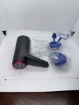 Wafjamf Electric Drinking Water Pump Dispenser For Kitchen Black And Purple. Fixed Price $8.99.