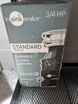 Insinkerator Garbage Disposal, Badger 5XP, 3/4 Hp Continuous Feed - Gray. Fixed Price $115.00.
