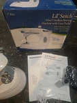 Dritz Lil' Stitch Mini Cordless Sewing Machine W/foot Pedal. Fixed Price $18.00.