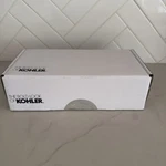 New, Kohler K-14377-CP Purist Toilet Paper Holder, Polished Chrome. Fixed Price $110.00.