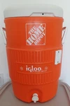 Igloo 5 Gallon Seat Top Water Cooler Jug With Cup Dispenser - Orange. Fixed Price $25.00.