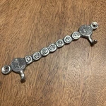Crosby Taylor Raindrop Swirl Pewter Art Metal Hammered Measuring Cup Hook Holder. Fixed Price $35.00.